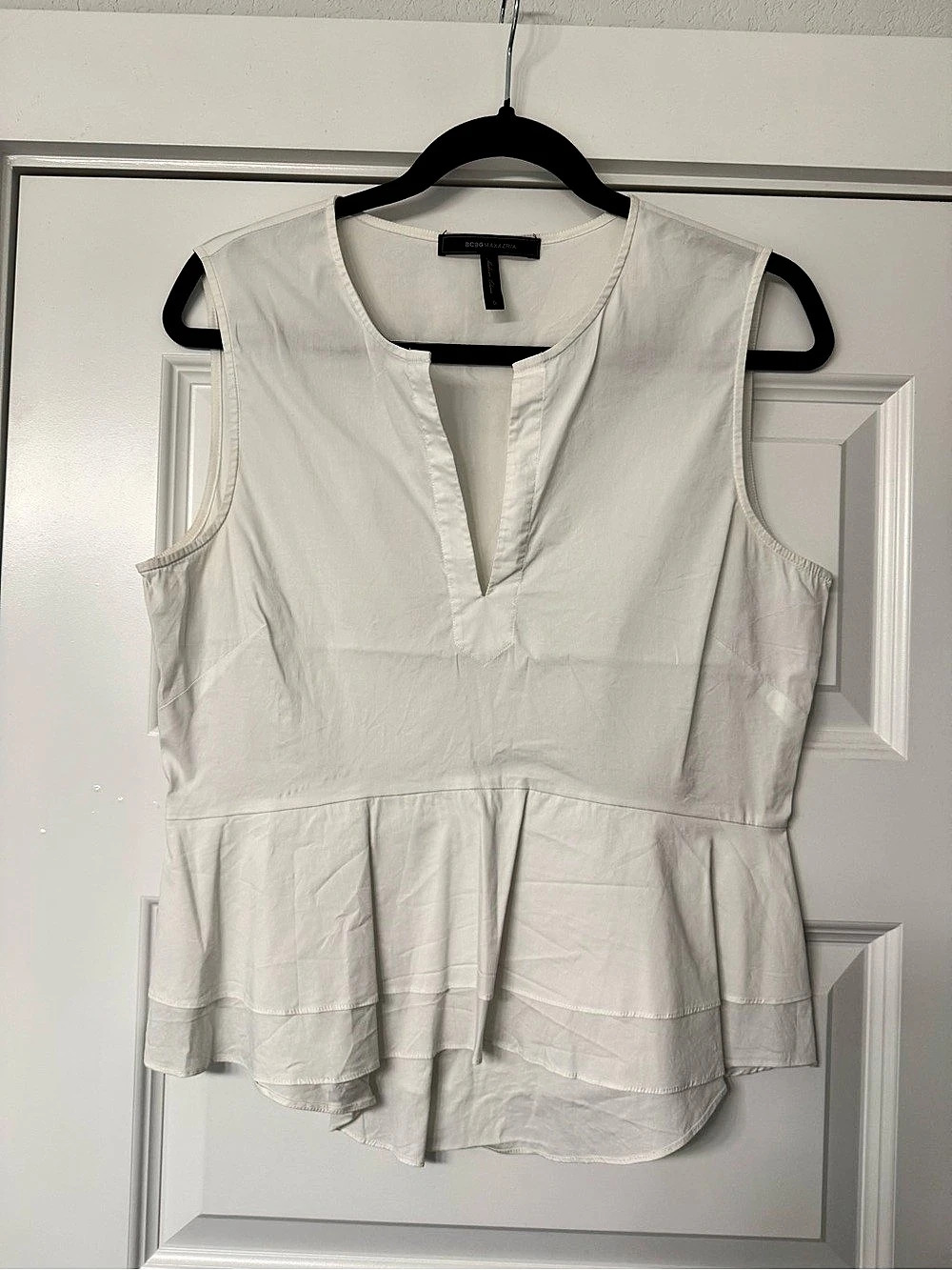 BCBGMAXAZRIA White Sleeveless Peplum Blouse